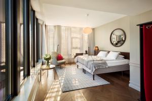 Кровать или кровати в номере Bergen Børs Hotel