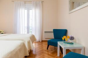 Posteľ alebo postele v izbe v ubytovaní Exclusive Center Apartments