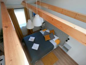 Postel nebo postele na pokoji v ubytování Gavan Room