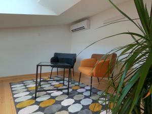 Posezení v ubytování Gavan Room