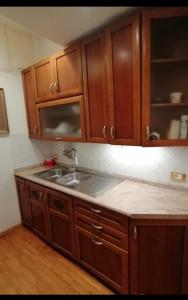 A kitchen or kitchenette at Gelsomino B&B Apartment