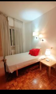 A bed or beds in a room at Gelsomino B&B Apartment