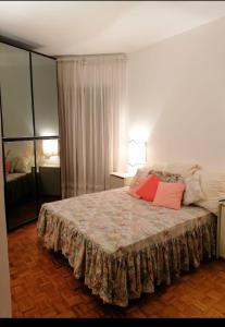A bed or beds in a room at Gelsomino B&B Apartment