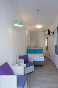 Postel nebo postele na pokoji v ubytování BLUE Seaside Studio