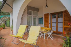 A patio or other outdoor area at Appartamenti Straccoligno