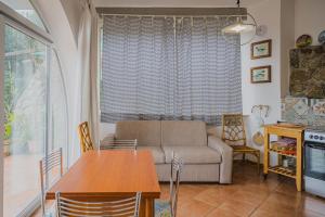 A kitchen or kitchenette at Appartamenti Straccoligno