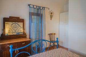 A bed or beds in a room at Appartamenti Straccoligno