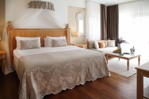 Кровать или кровати в номере Cocos The Club Solto