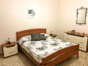 Posteľ alebo postele v izbe v ubytovaní Casa Conchiglia