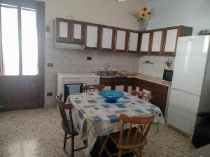 Kuchyňa alebo kuchynka v ubytovaní Casa Conchiglia