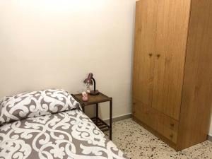 Posteľ alebo postele v izbe v ubytovaní Casa Conchiglia