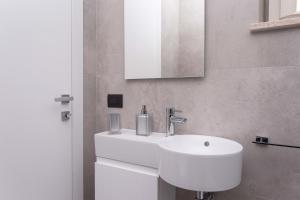 Koupelna v ubytování A06 - Massignano, meravigliosa camera con vista + 3 fotografie