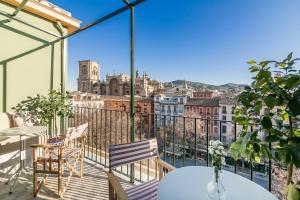a balcony with a view of the city at La Bella Granada in Granada