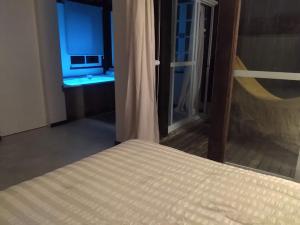 Katil atau katil-katil dalam bilik di Pousada Pedra da Boa Vista