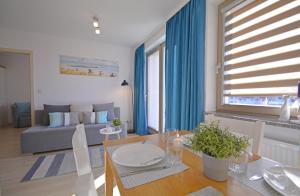 Posezení v ubytování Apartamenty Bryza - Osiedle Kwartał Róży Wiatrów - Centrum - Parking