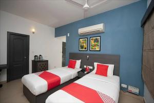 Foto da galeria de StayEasy Tiruvanmiyur (Unit of Prohotel) em Chennai