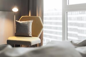 Postel nebo postele na pokoji v ubytování Candlewood Suites Berlin Charlottenburg by IHG