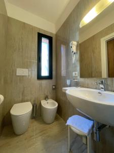 Salle de bains dans l'établissement Hotel Marco Polo