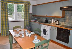 Kjøkken eller kjøkkenkrok på Keepers Cottage