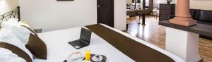 TV a/nebo společenská místnost v ubytování Hotel Misión Xalapa