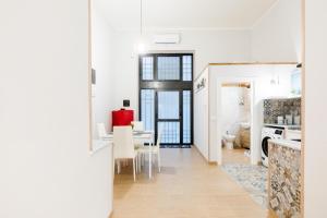 Kuchyň nebo kuchyňský kout v ubytování Palazzo Butera Cozy Studio Apartment