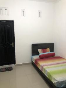 Postel nebo postele na pokoji v ubytování Beverly Residence