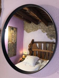Postel nebo postele na pokoji v ubytování Casa Rustic Suites, JACUZI & LOVE