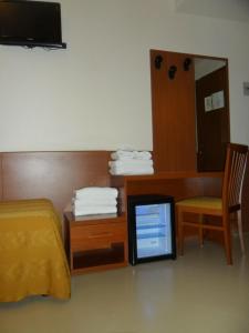 Telewizja i/lub zestaw kina domowego w obiekcie Hotel Everest