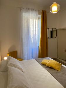 Postel nebo postele na pokoji v ubytování BIANCA ROOMS + 10 fotografií