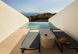 a view of a pool from a house at PAROCKS Luxury Hotel & Spa in Ambelas