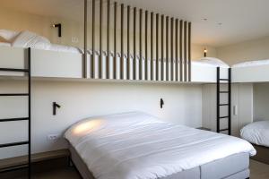 Poschodová posteľ alebo postele v izbe v ubytovaní GLUK