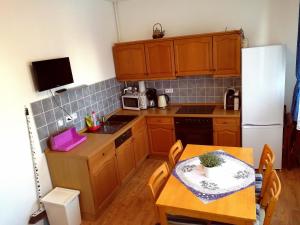 Kuchyň nebo kuchyňský kout v ubytování Apartmány Agáta Abertamy