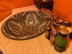 a sink on a table with a sink at Luxury Suerte Camp in Merzouga +22 photos