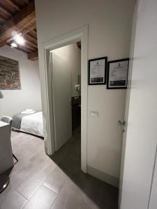 Postel nebo postele na pokoji v ubytování Casa Carducci 33