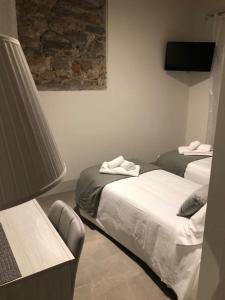 Postel nebo postele na pokoji v ubytování Casa Carducci 33