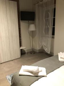 Postel nebo postele na pokoji v ubytování Casa Carducci 33