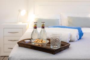 A bed or beds in a room at Costa den Blau