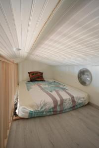 Postel nebo postele na pokoji v ubytování Le Mas sous le Vent