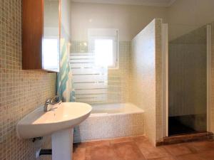 A bathroom at Holiday Home in Arenas with Private Pool