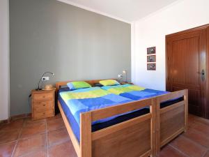 A bed or beds in a room at Holiday Home in Arenas with Private Pool