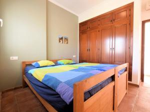 Postel nebo postele na pokoji v ubytování Belvilla by OYO Villa Bandoleros