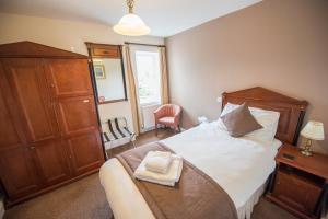 Ein Bett oder Betten in einem Zimmer der Unterkunft The Frocester