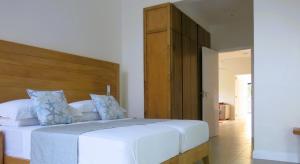 Postel nebo postele na pokoji v ubytování Lyla Beach Villa