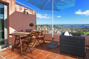 A balcony or terrace at Salobre Morro Golf 2