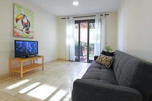 A television and/or entertainment centre at Salobre Morro Golf 2