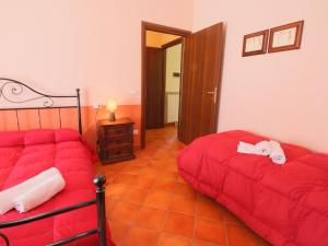 A bed or beds in a room at Apartment in Marche with Pool Access