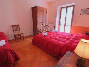 A bed or beds in a room at Apartment in Marche with Pool Access