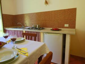 A kitchen or kitchenette at Apartment in Marche with Pool Access
