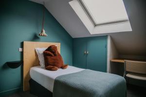 Hotel Spa Azteca Barcelonnette房間的床