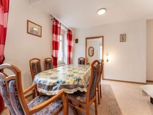 a dining room with a table and chairs at Comfortable Apartment in Ediger Eller Eifel in Sankt Aldegund